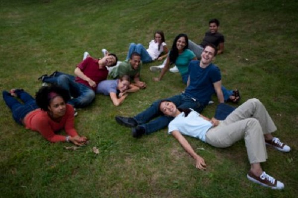 friends laying on grass