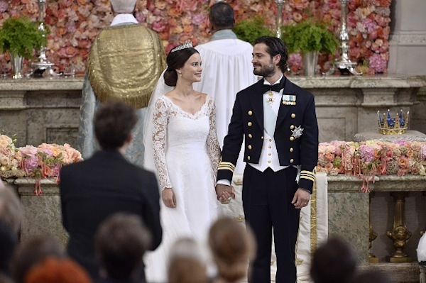 Sofia Hellqvist (R) and Sweden's Prince Carl Philip stand at the alter during their wedding ceremony at the Royal Chapel in Stockholm Palace on June 13, 2015. AFP PHOTO / TT NEWS AGENCY /  CLAUDIO BRESCIANI  SWEDEN OUT        (Photo credit should read Claudio Bresciani/AFP/Getty Images)