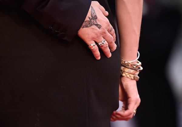 VENICE, ITALY - SEPTEMBER 04:  Johnny Depp and Amber Heard, detail, attend a premiere for 'Black Mass' during the 72nd Venice Film Festival at  on September 4, 2015 in Venice, Italy.  (Photo by Ian Gavan/Getty Images)