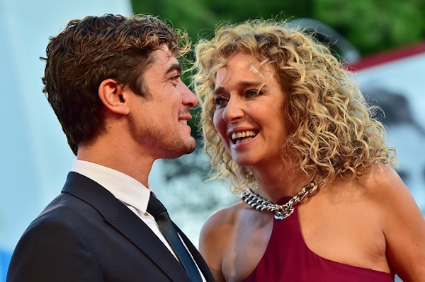 actress Valeria Golino and actor Riccardo Scamarcio arrive for the screening of the movie "Lao Pao" (Mr Six) presented out of competition for the closing ceremony of the 72nd Venice International Film Festival on September 12, 2015 at Venice Lido. AFP PHOTO / GIUSEPPE CACACE (Photo credit should read GIUSEPPE CACACE/AFP/Getty Images)
