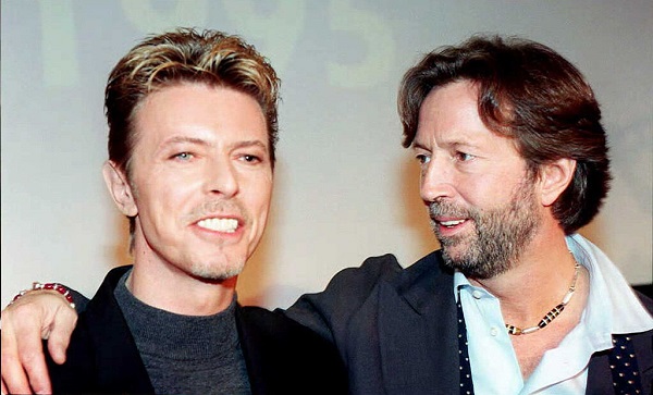 Singers David Bowie (L) and Eric Clapton
